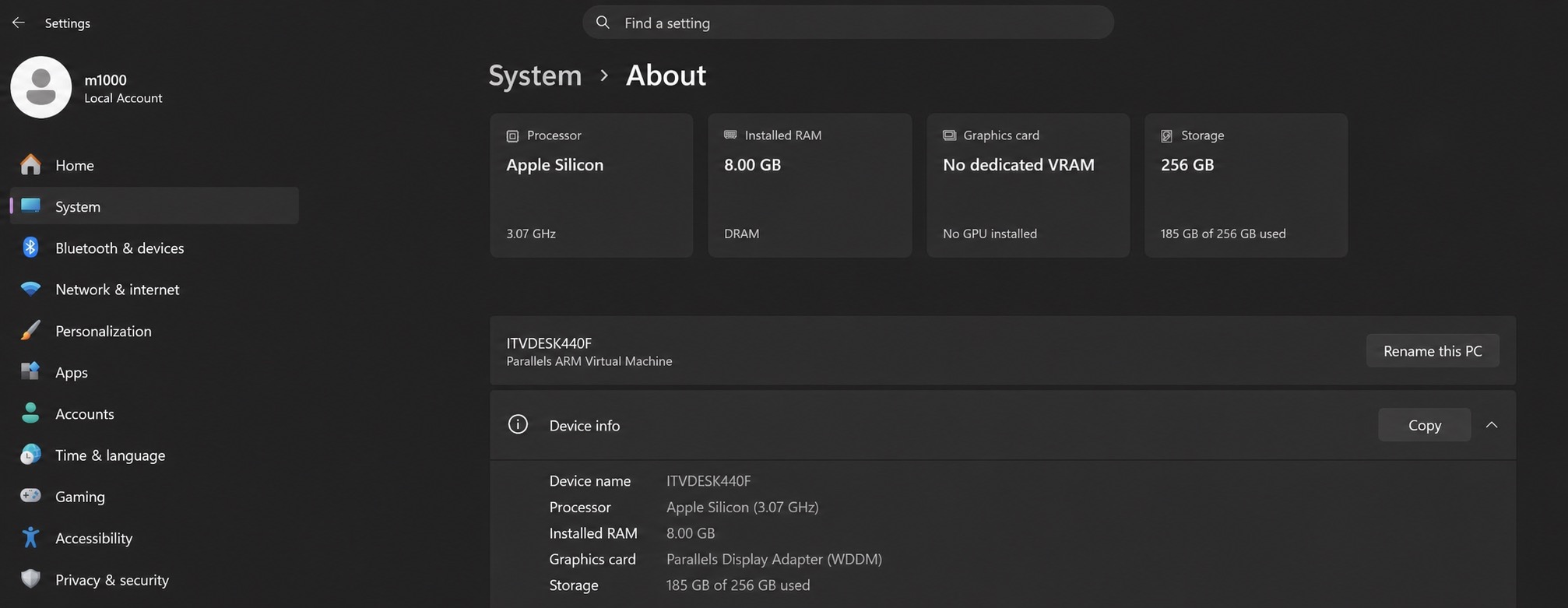 Windows 11 System About page with Device name and Rename this PC button